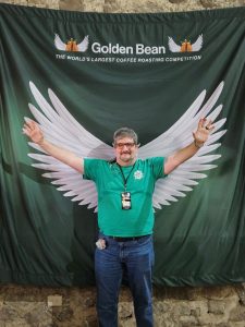 Tim in a wing span photo op at Golden Bean World Series 2025
